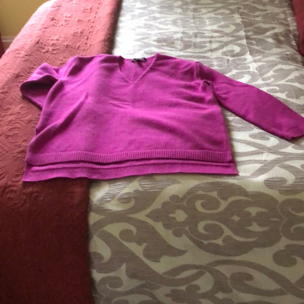 A purple sweater.